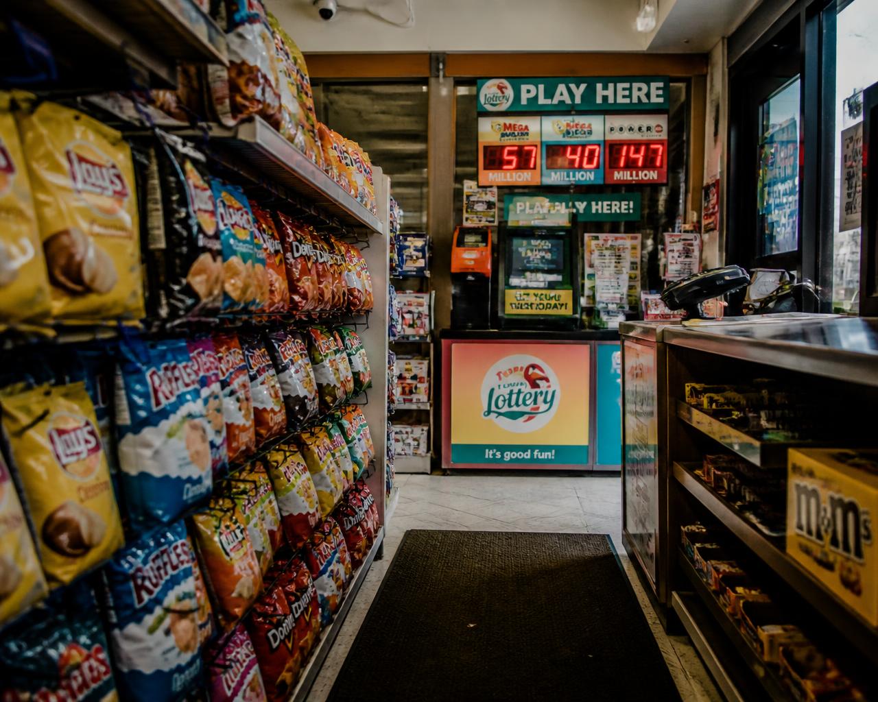 Snack aisle, OLG lottery kiosk and Bitcoin ATM